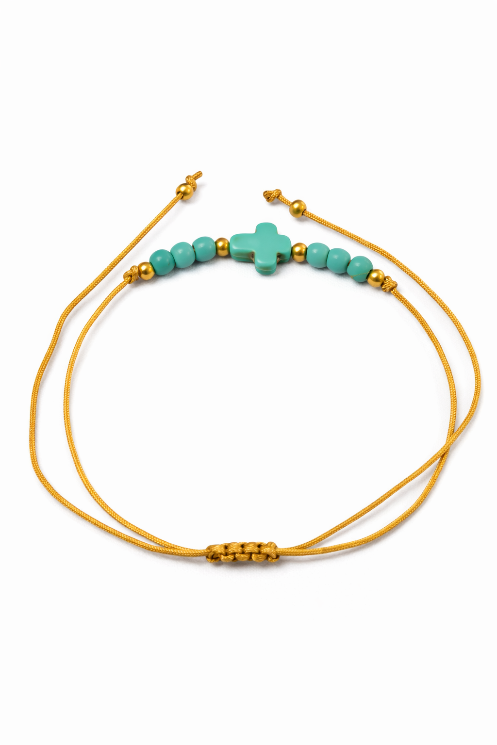 Pulsera ajustable con cruz turquesa y detalles dorados