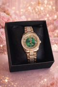 Reloj femenino con detalles dorados