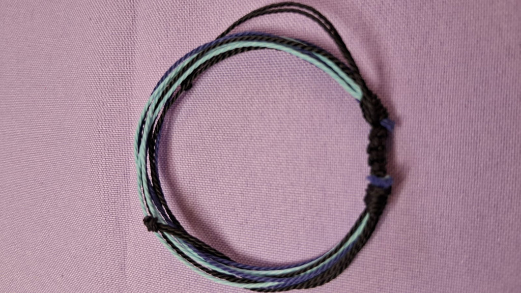 Pulsera ajustable de hilo encerado