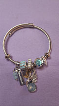 Pulsera Charm Plateada con Dijes